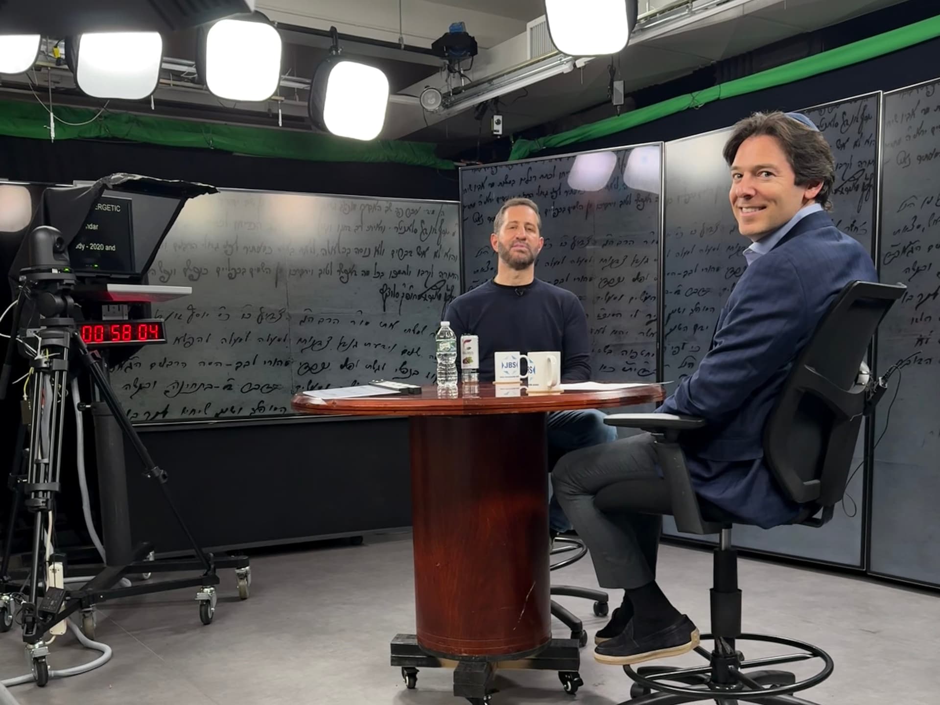 Justin Pines interviews stand-up comedian Modi Rosenfeld on the set of JBS