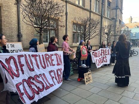 Protesters holding banners
