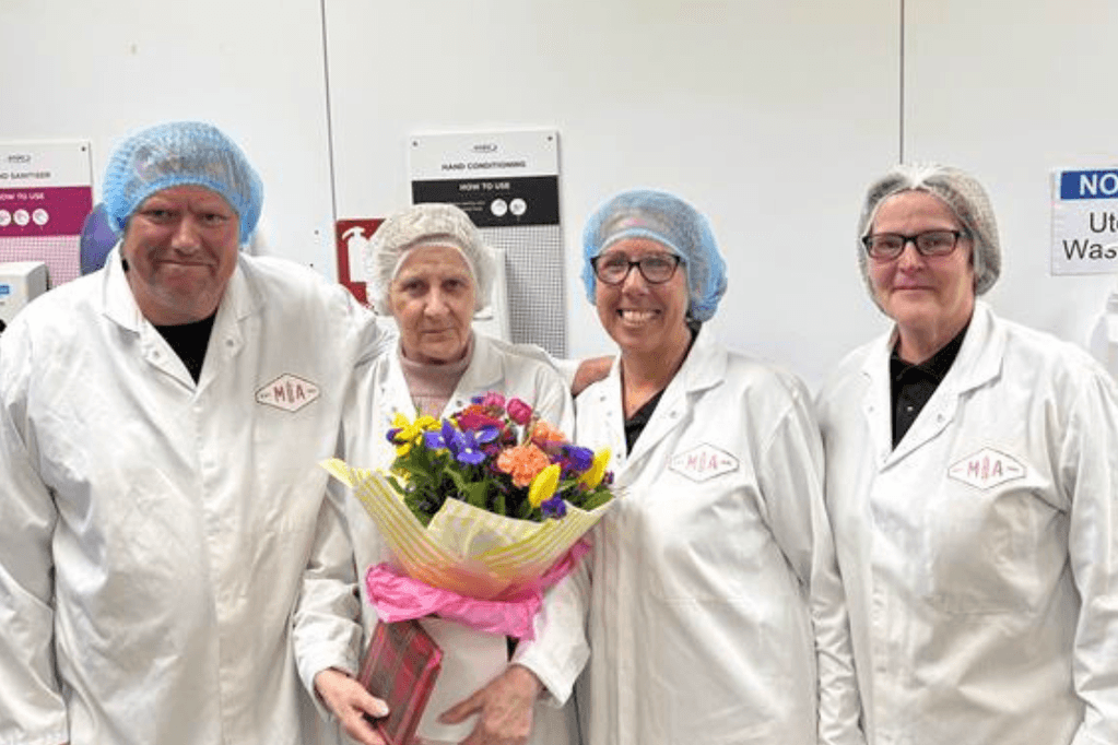 Chrissie (second from left) with owners Paul and Katrina, and bakery worker Lorraine