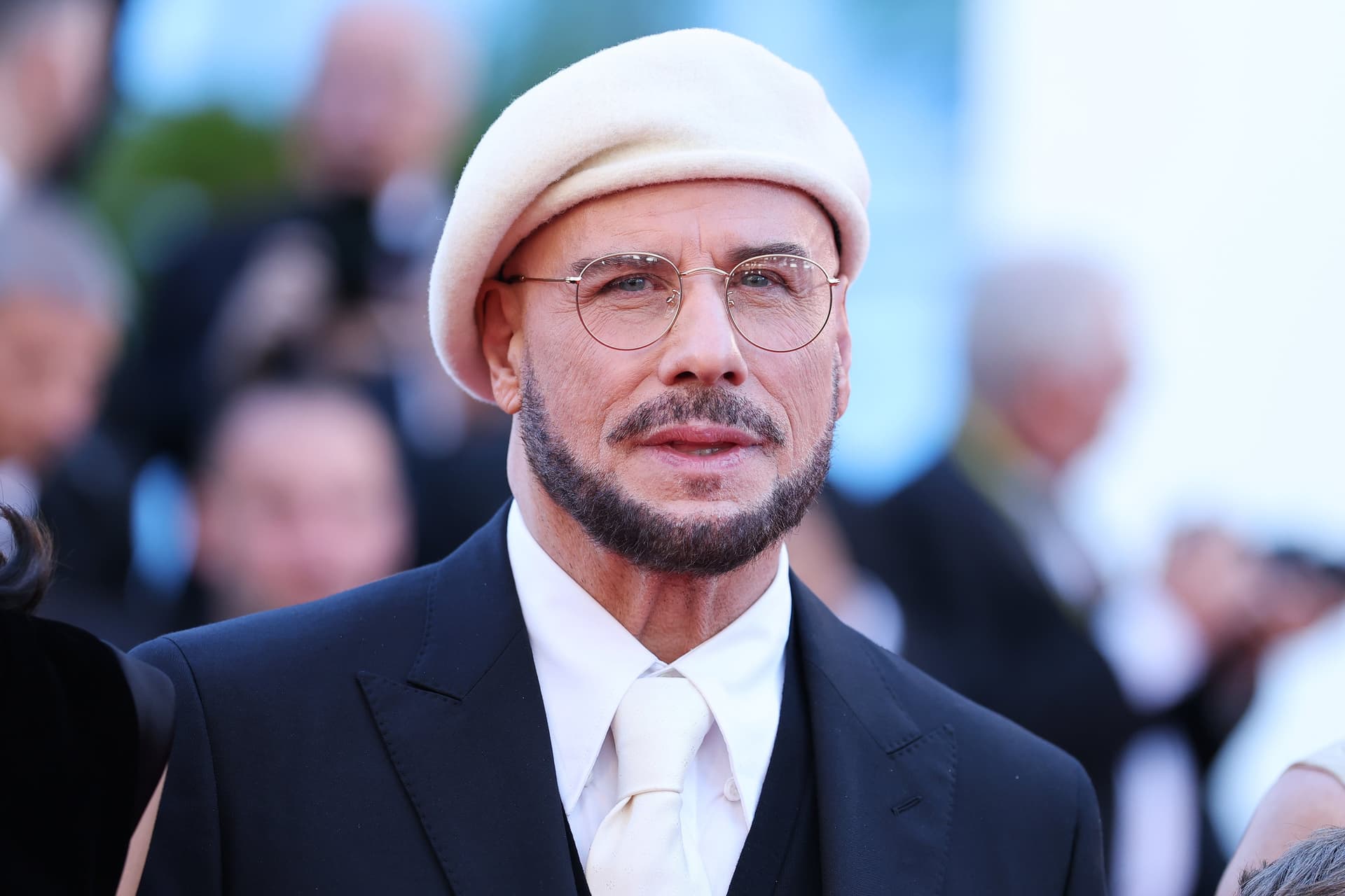 John Travolta unveiled his dramatic new look at Cannes Film Festival this week, where he is showcasing his directorial debut, âPropeller One-Way Night Coachâ